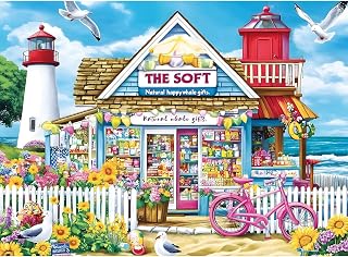 500 Piece Jigsaw Puzzle for Adults, Seaside Gift Shop & Lighthouse | Charming seaside shop, lighthouse, pink bicycle and blooming flowers create a bright coastal scene, 20.5 x 15 in